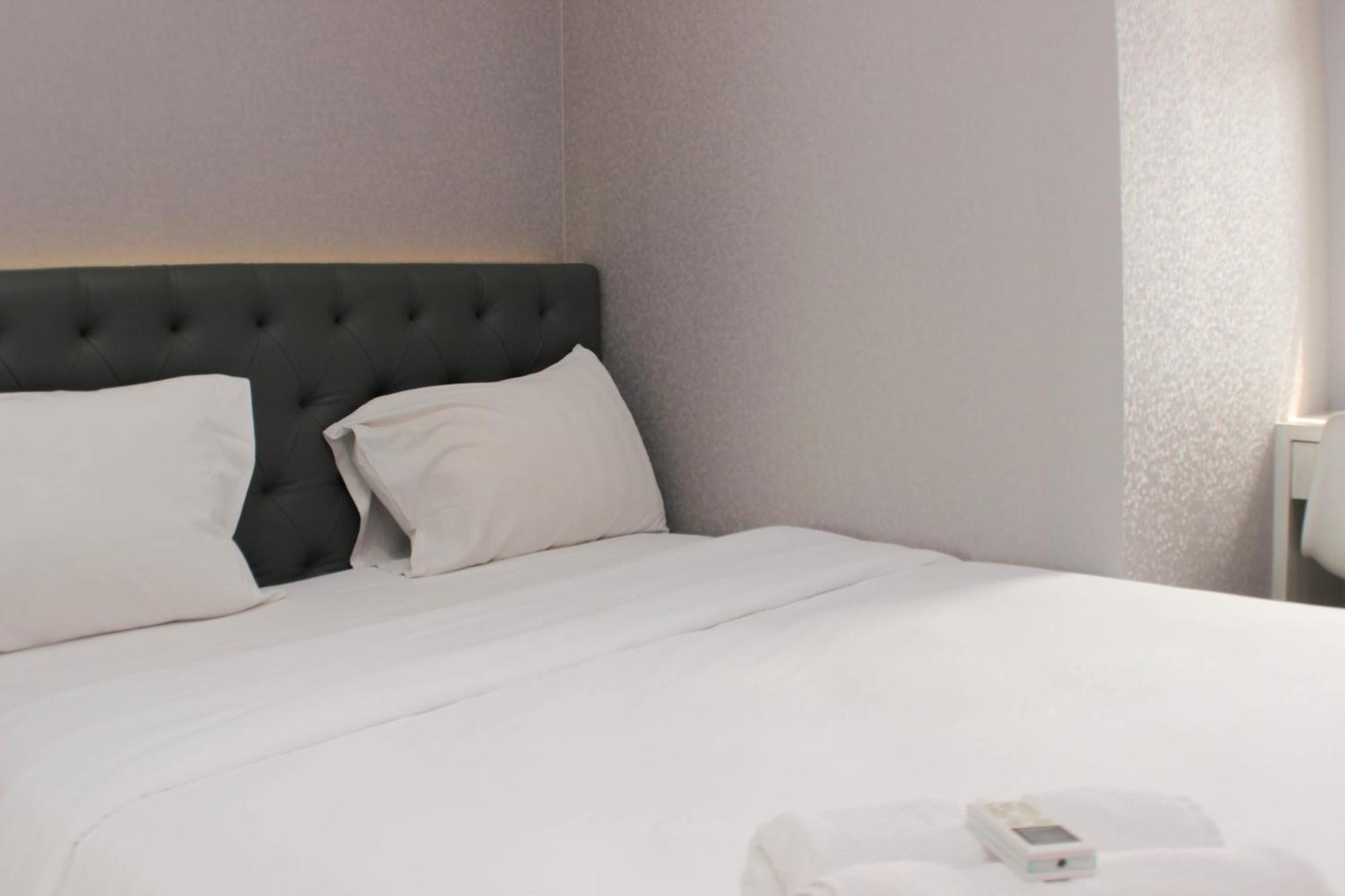 Warm And Enjoy Living 2br At Springlake Summarecon By Travelio